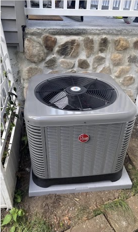 New Rheem AC condenser installed by Ala & Sons in a customer's Wakefield, MA home